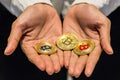 Bitcoin in hand,war of bitcoin,pull bitcoin with hand to hand, m Royalty Free Stock Photo