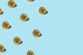 Bitcoin izometric pattern on bright light blue background. Royalty Free Stock Photo