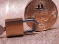 Bitcoin and padlock