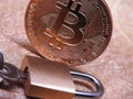Bitcoin and closed padlock
