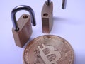 Bitcoin and brass padlocks Royalty Free Stock Photo