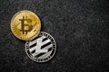 Bitcoin, Litecoin coins on black background Royalty Free Stock Photo