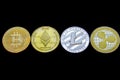 Bitcoin litecoin ethereum and ripple coins isolated on black background