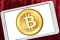 Bitcoin logo on sumsung tab Royalty Free Stock Photo