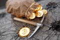 Bitcoin mining concept with pickaxe and leather bag