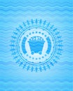 Bitcoin mining trolley icon inside water wavec oncept emblem