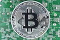 Bitcoin on motherboard Royalty Free Stock Photo