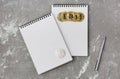 Bitcoin on a notebook, coin bitcoin on a table Royalty Free Stock Photo