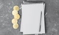 Bitcoin on a notebook, coin bitcoin on a table Royalty Free Stock Photo