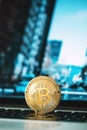 Bitcoin standing on a notebook, bitcoin concept, business background, cryptocurrency, blockchain Royalty Free Stock Photo