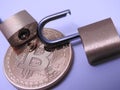 Bitcoin and brass padlocks Royalty Free Stock Photo