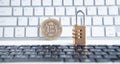 Bitcoin and padlock on the white computer keyboard Royalty Free Stock Photo