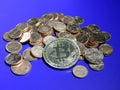 Bitcoin on a pile of Euro cents Royalty Free Stock Photo