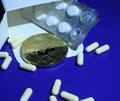 Bitcoin and pills Royalty Free Stock Photo