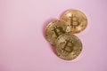 Bitcoin on pink background, cryptocurrency concept