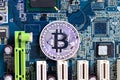 Bitcoin is placed on the motherboard, applicable to the business Royalty Free Stock Photo