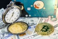 Bitcoin and pocket watch on us dollars with hard disk Royalty Free Stock Photo