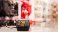 Bitcoin on the POS terminal. Bitcoinand POS-terminal.Busibess, finance concept. crypto currency symbol Royalty Free Stock Photo