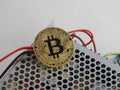Bitcoin on power supply Royalty Free Stock Photo