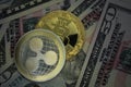 Bitcoin and Ripple Crypto Coins on a Dollars