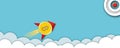 Bitcoin shaped like a rocket hitting in the target on with cloud on a blue background rising up. Royalty Free Stock Photo