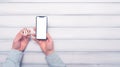 Bitcoin shopping trading concept. Man making online payment on smartphone. Toned picture, Flat lay top view copy space, mockup Royalty Free Stock Photo