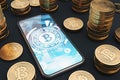 Bitcoin smartphone on table, physical bitcoins