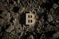 Bitcoin Symbol on Construction Dirt