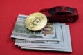 Bitcoin is a symbol of wealth, dollars and machine Royalty Free Stock Photo