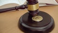 4k resolution of a gavel striking right on Bitcoin coin, crypto currency legalization concept