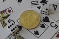 Bitcoin token with cards and dice Royalty Free Stock Photo