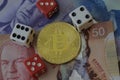 Bitcoin Token with Money and Dice Royalty Free Stock Photo