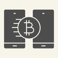 Bitcoin transfer solid icon. Crypto coin and smartphones vector illustration isolated on white. Cryptocurrency on phone