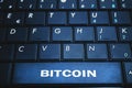 Bitcoin word on the computer keyboard. Blockchain concept. Royalty Free Stock Photo