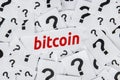 Bitcoin word with question marks symbol