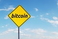 Bitcoin word on the yellow signboard