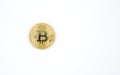 New virtual money: Golden bitcoin coin on a white Background. The future Cryptocurrency. Business and Trading concept. Royalty Free Stock Photo