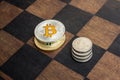 Bitcoins and American cents on a chessboard