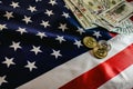 Bitcoins and american dollar bills with US flag background, copy space