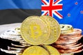 Bitcoins on Estonia and New Zealand flag background