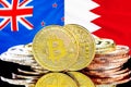 Bitcoins on Bahrain and New Zealand flag background
