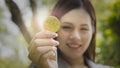 A bitcoins - Bitcoin in hand of a casual businesswoman to show the