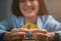 Bitcoins, Bitcoin in hand of woman, Digital cryptocurrency Online, virtual future currency concept