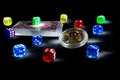 Bitcoins, cards, dices on black background. Cryptocurrencie gambling concept