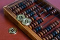 Bitcoins and classic abacus and symbol of new and old financial tool . Bitcoin is a crypto currency, a form of electronic cash. Royalty Free Stock Photo