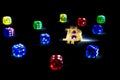 Bitcoins, dices on black background. Cryptocurrencie gambling concept,