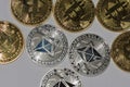 bitcoins and ether coins from cryptocurrency detail