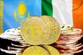 Bitcoins on Kazakhstan and Ireland flag background