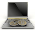 Bitcoins with laptop computer