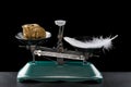 Bitcoins lighter than a feather on black
